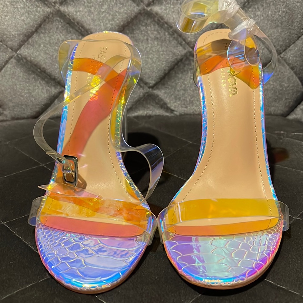 Iridescent sandals with heel.